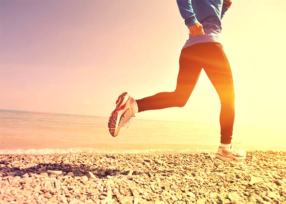 Runner athlete running on seaside.